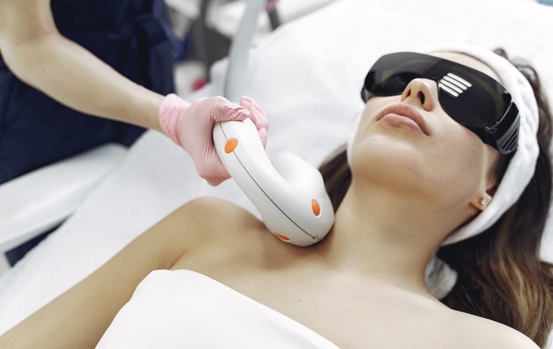 Woman in cosmetology studio on laser hair removal